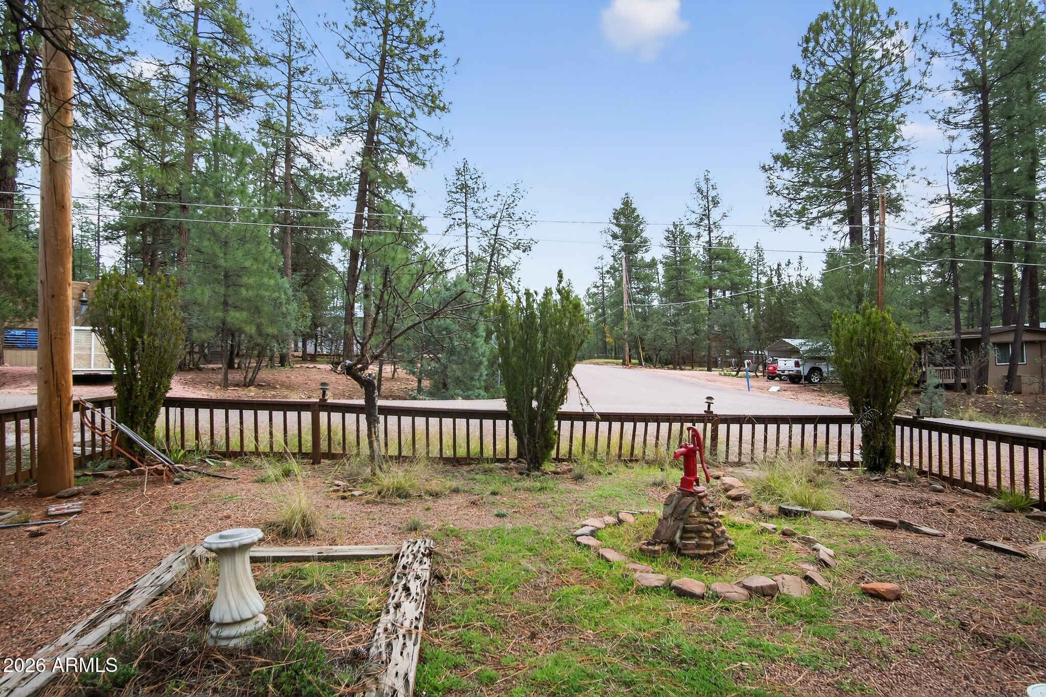 8884 Tonto Rim Drive Pine, AZ 85544 - Photo 7 of 43 a view of a deck with a yard