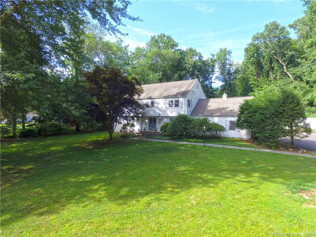 923 Galloping Hill Road Fairfield, CT 06824 - Photo 1 of 1 a front view of a house with a yard