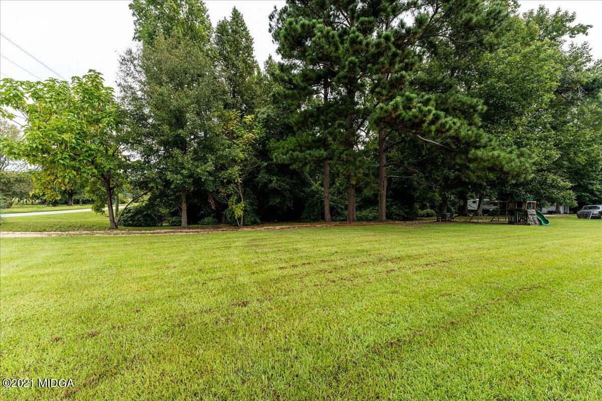 7455 Columbus Road Lizella, GA 31052 - Photo 8 of 32 a view of green field