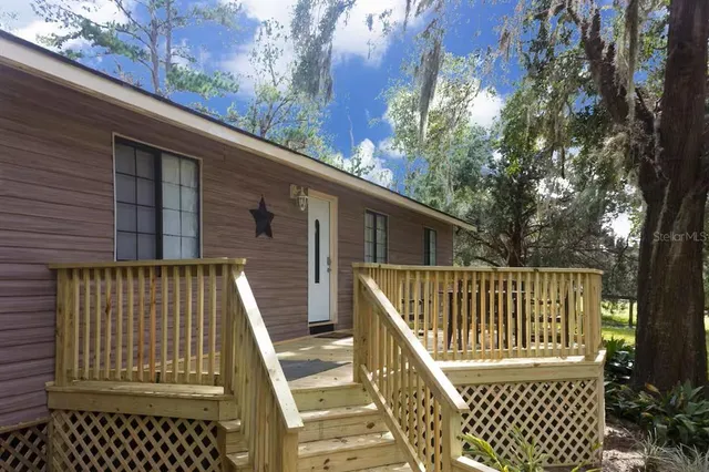 a view of balcony with wooden wall