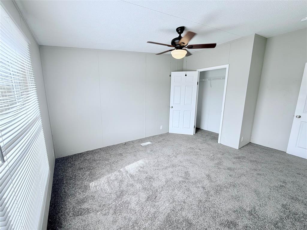 6100 Preston Road Denison, TX 75020 - Photo 15 of 20 a view of a big room with carpet