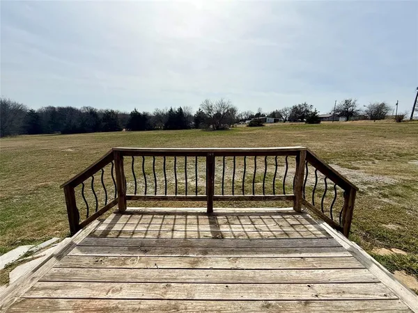 a view of swimming pool with a lake view