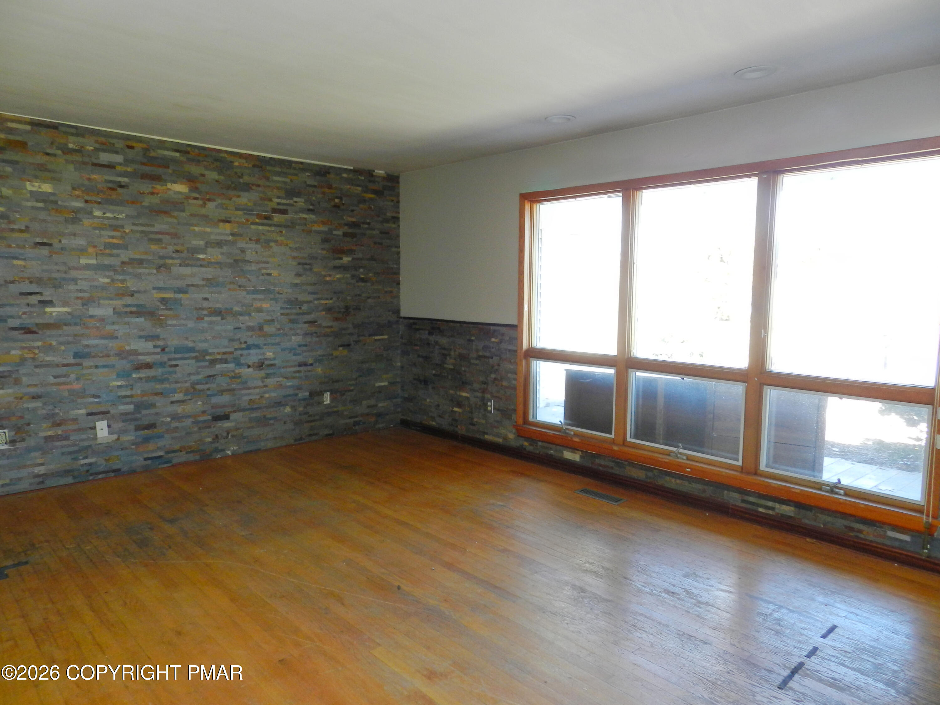 1055 Pine Tree Drive Slatington, PA 18080 - Photo 15 of 38 a view of an empty room and window