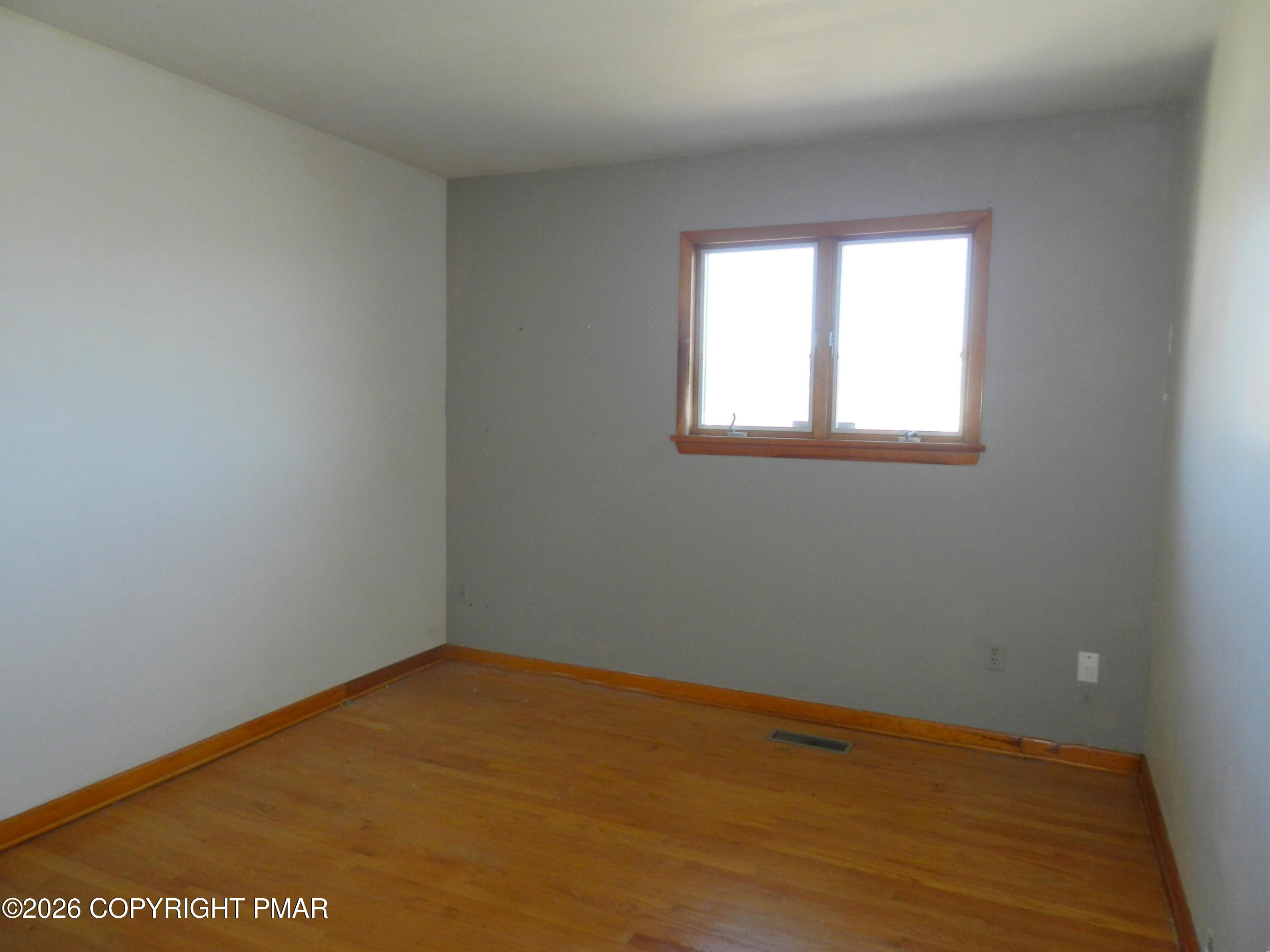 1055 Pine Tree Drive Slatington, PA 18080 - Photo 16 of 38 an empty room with a window
