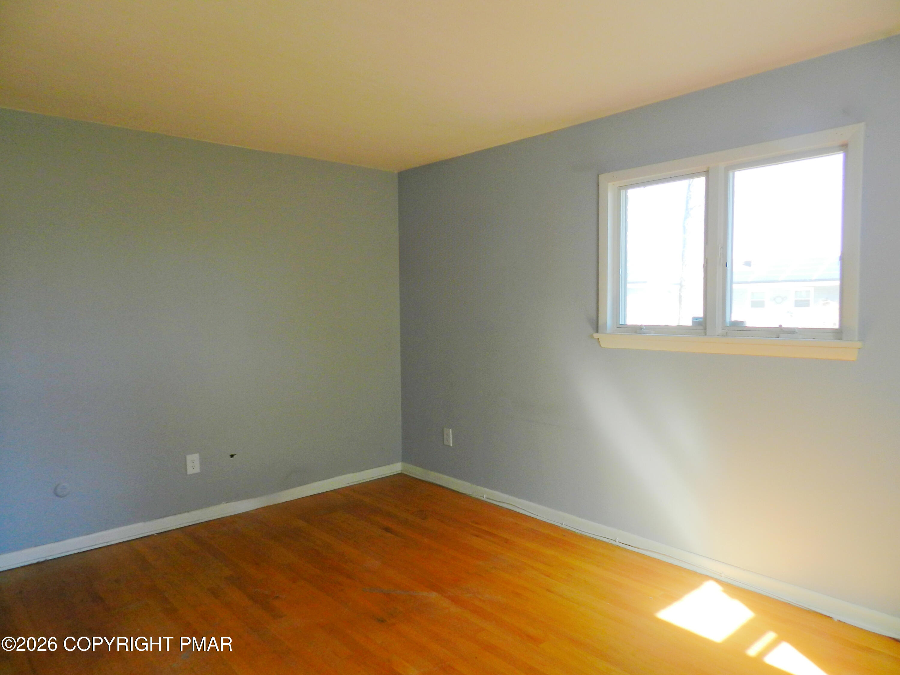 1055 Pine Tree Drive Slatington, PA 18080 - Photo 20 of 38 an empty room with a window