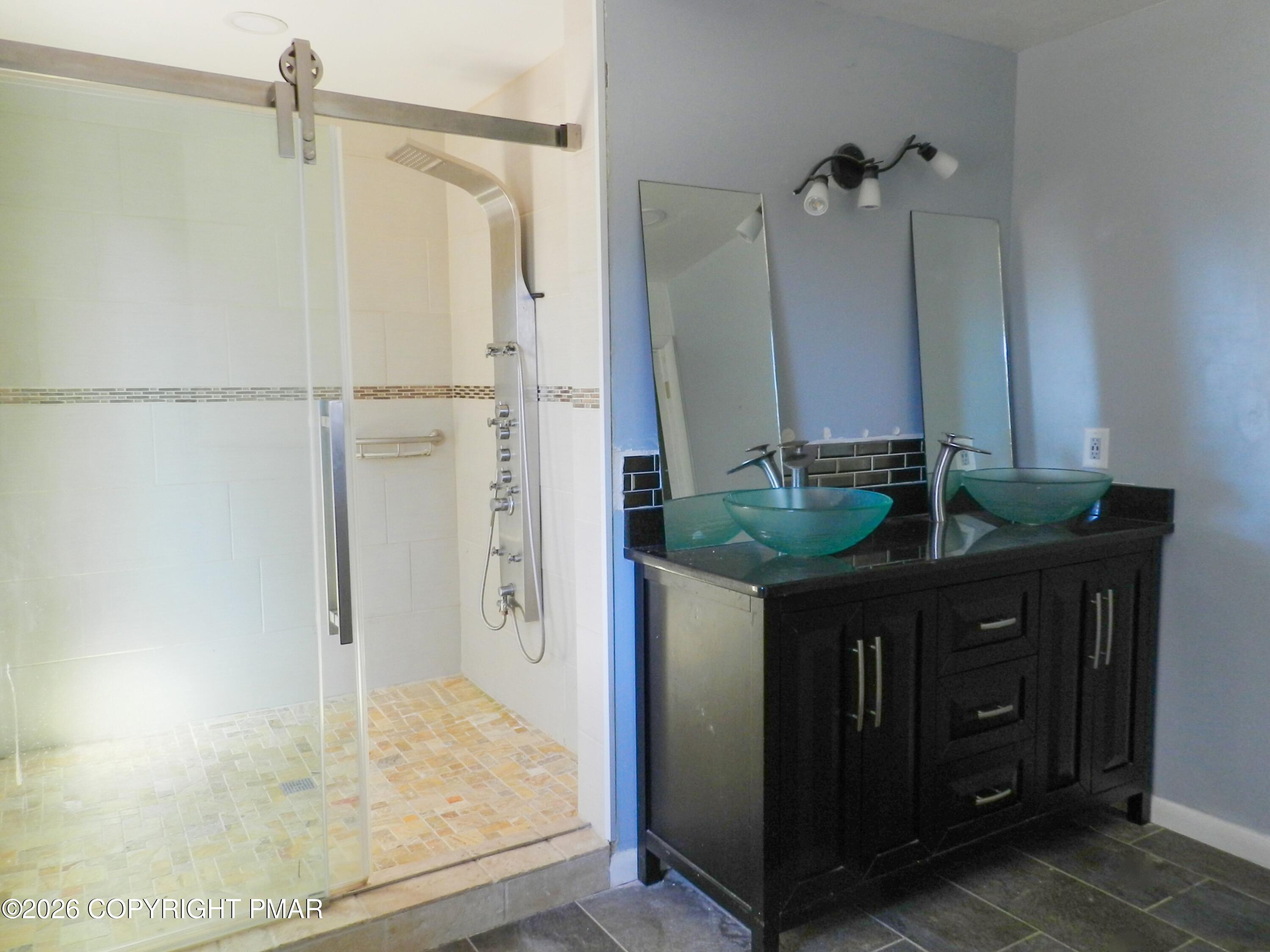 1055 Pine Tree Drive Slatington, PA 18080 - Photo 28 of 38 a bathroom with a sink and a mirror