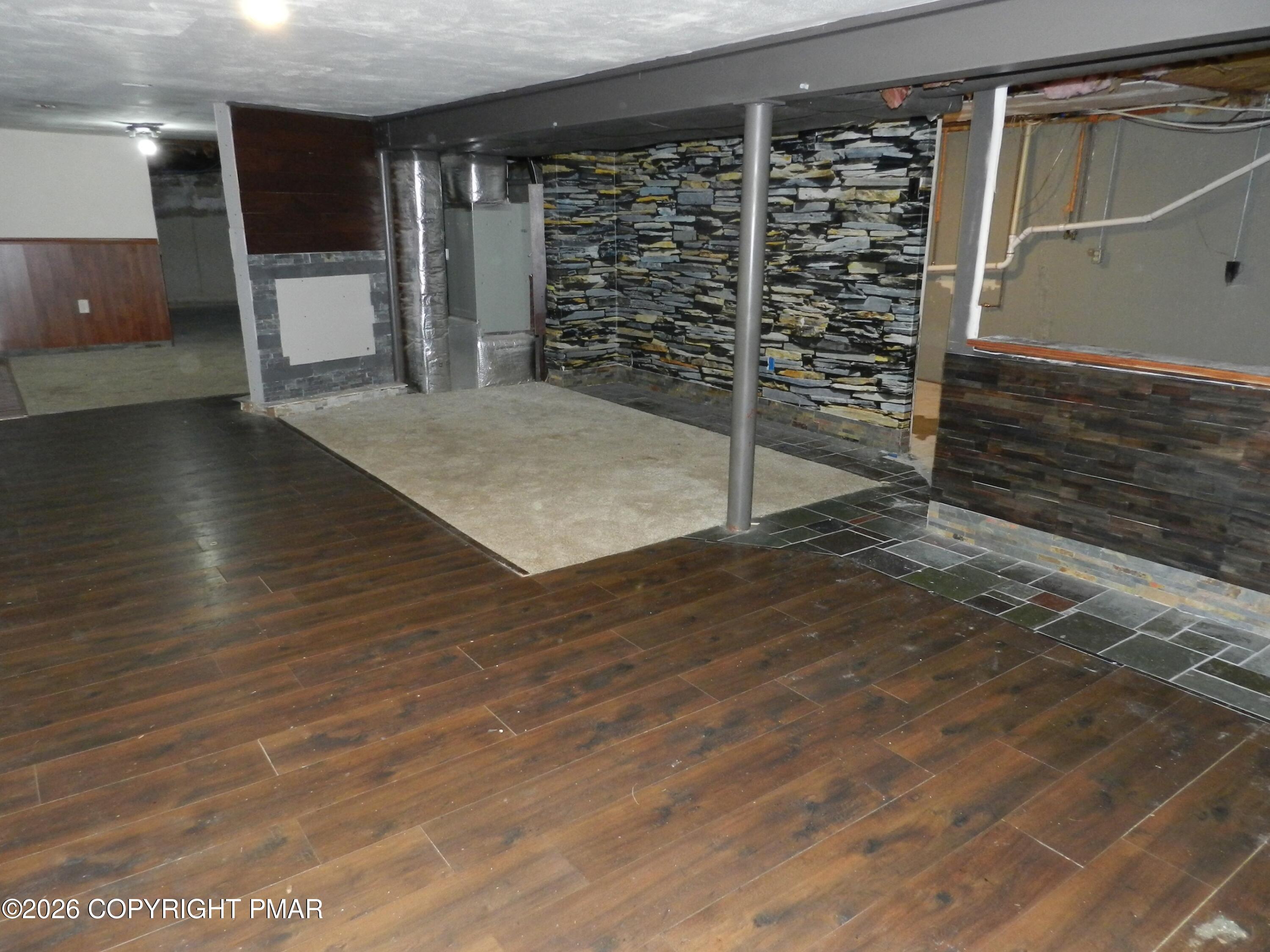 1055 Pine Tree Drive Slatington, PA 18080 - Photo 32 of 38 a view of a room with wooden floor