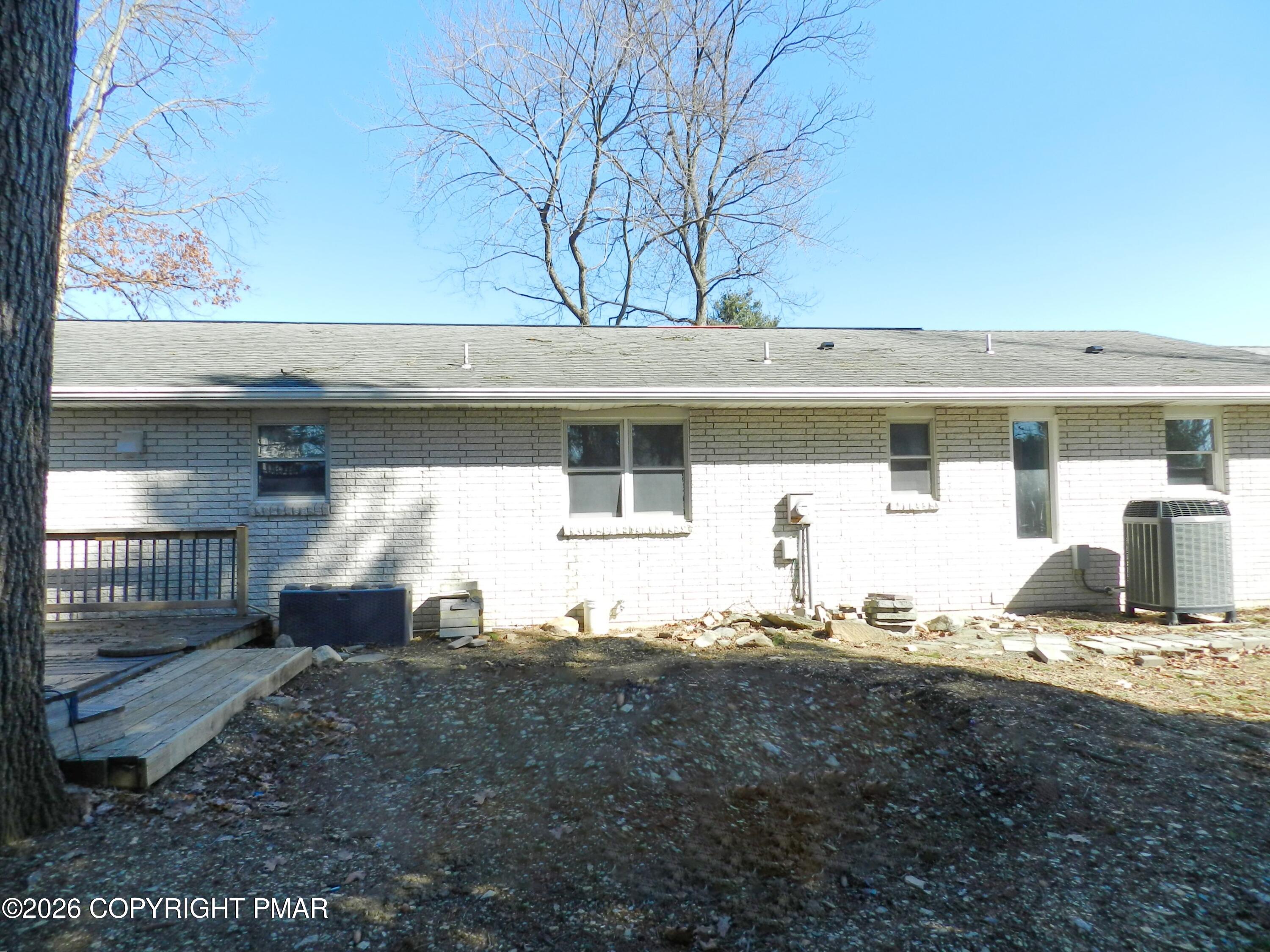 1055 Pine Tree Drive Slatington, PA 18080 - Photo 6 of 38 a front view of a house with a yard