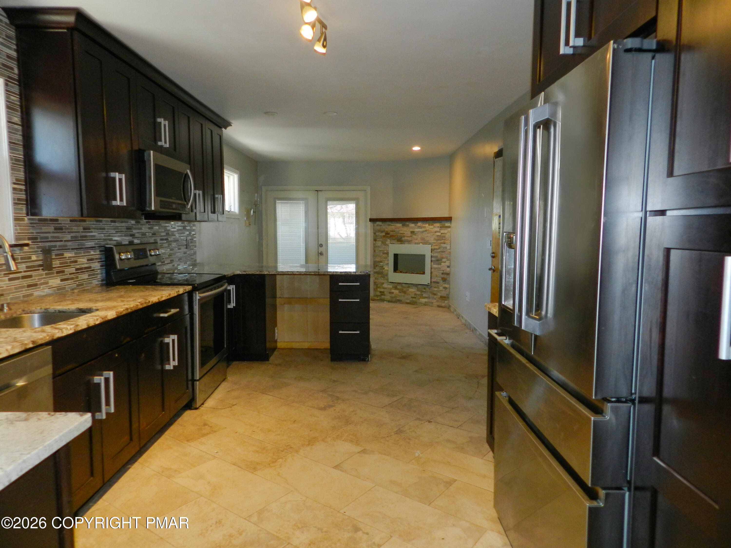 1055 Pine Tree Drive Slatington, PA 18080 - Photo 9 of 38 a large kitchen with cabinets and stainless steel appliances