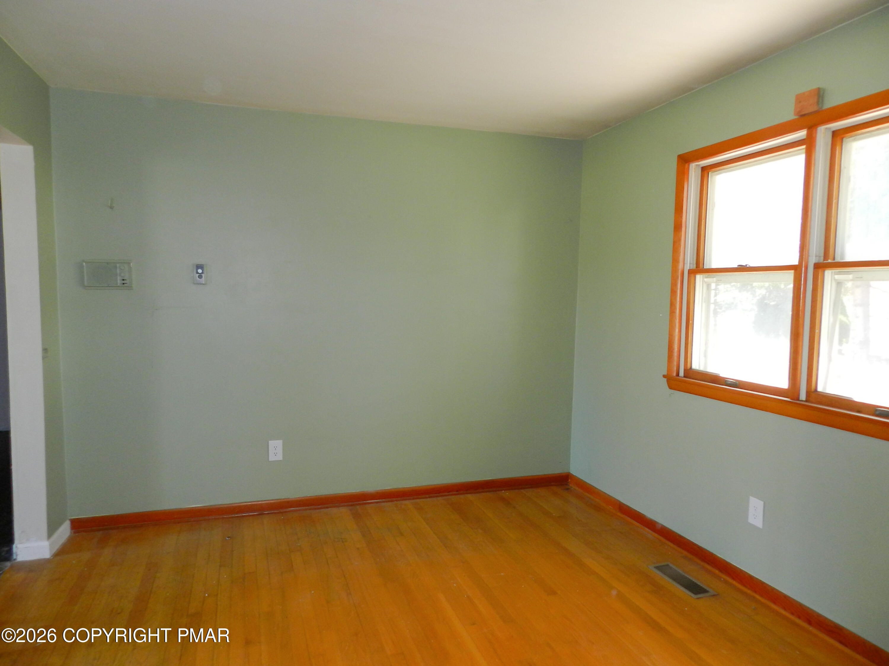1055 Pine Tree Drive Slatington, PA 18080 - Photo 10 of 38 an empty room with a window