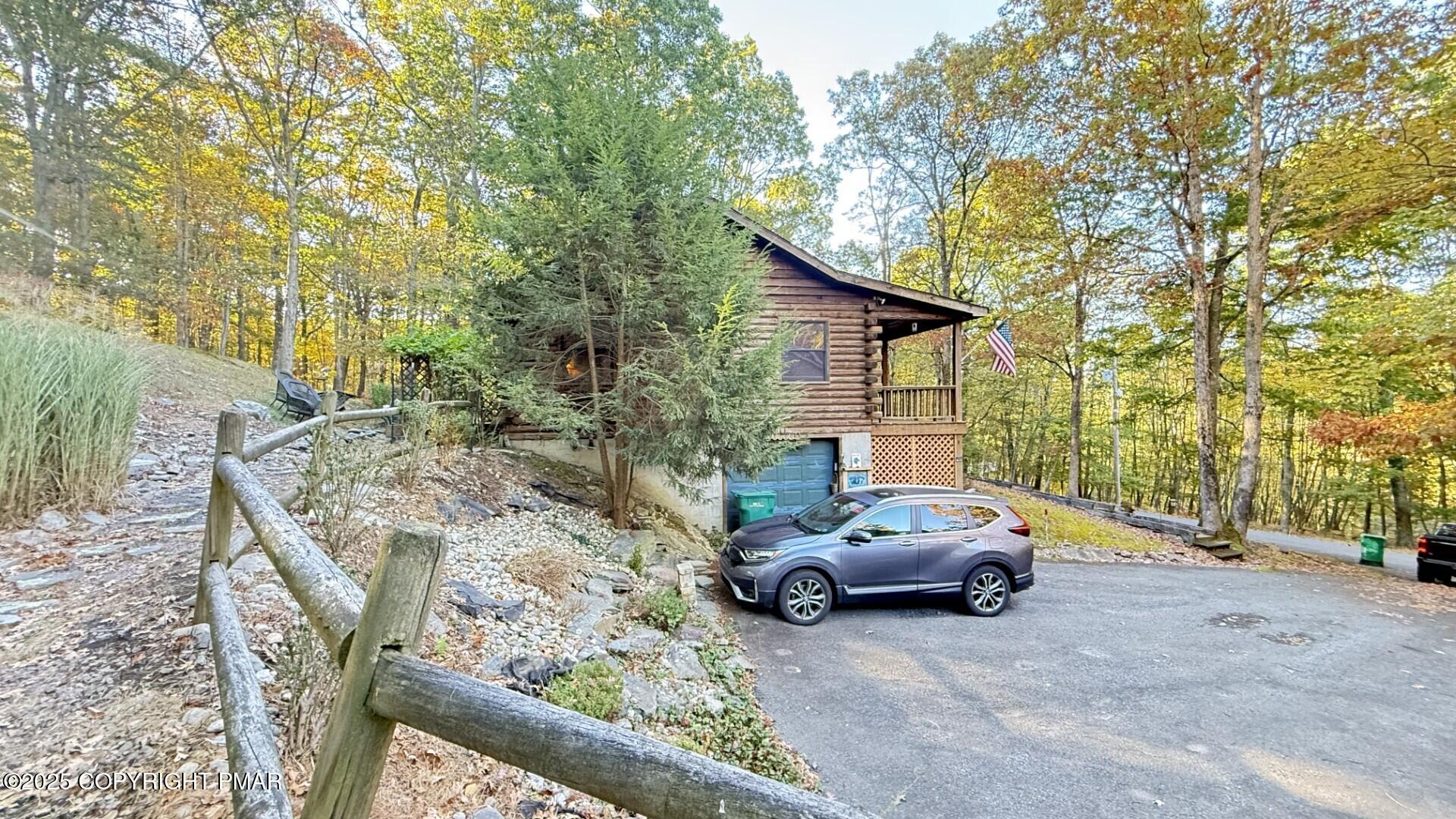2119 Meadow Lark Circle Bushkill, PA 18324 - Photo 30 of 34 a view of a car parked on the side of the road