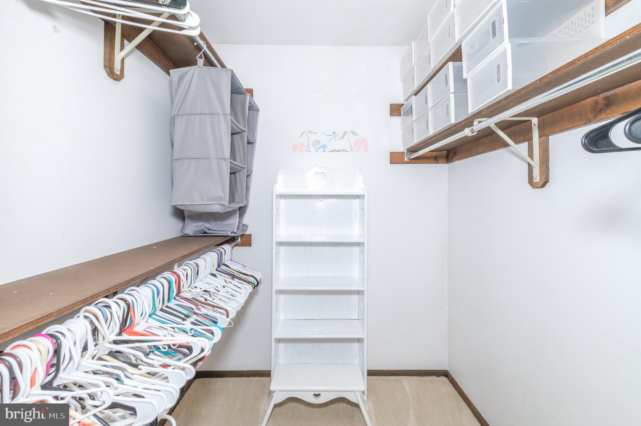 434 4th Street Atco, NJ 08004 - Photo 23 of 69 a view of walk in closet with empty racks