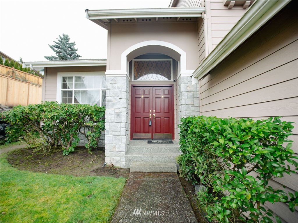 20405 28th Avenue Southeast Bothell, WA 98021 - Photo 1 of 9 a front view of a house with garden