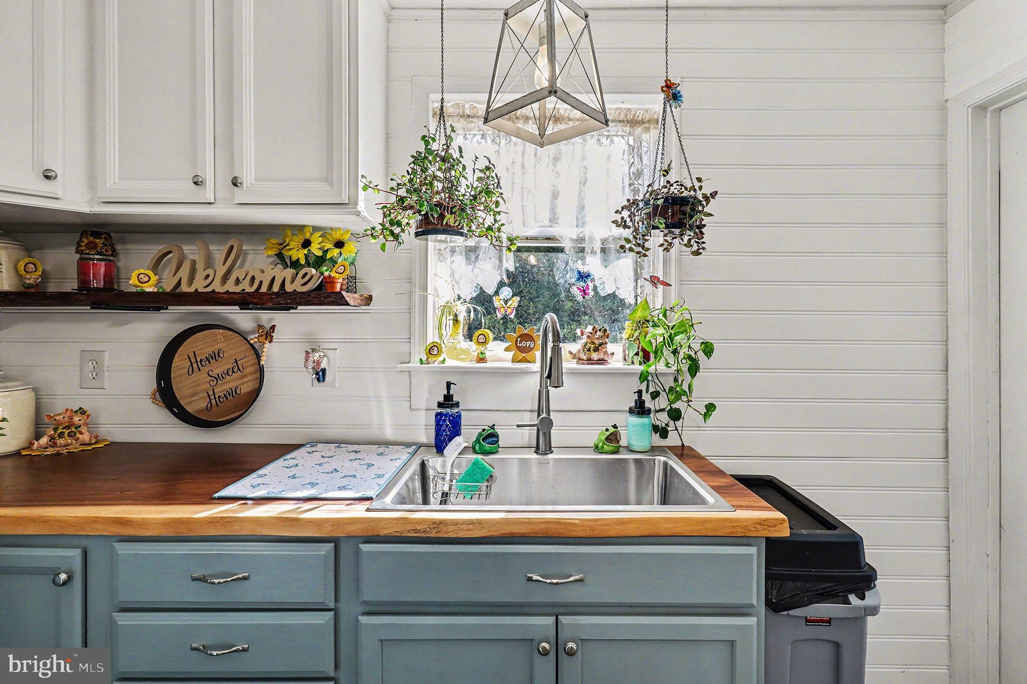 2033 Courthouse Road Heathsville, VA 22473 - Photo 11 of 50 a kitchen with a sink and cabinets