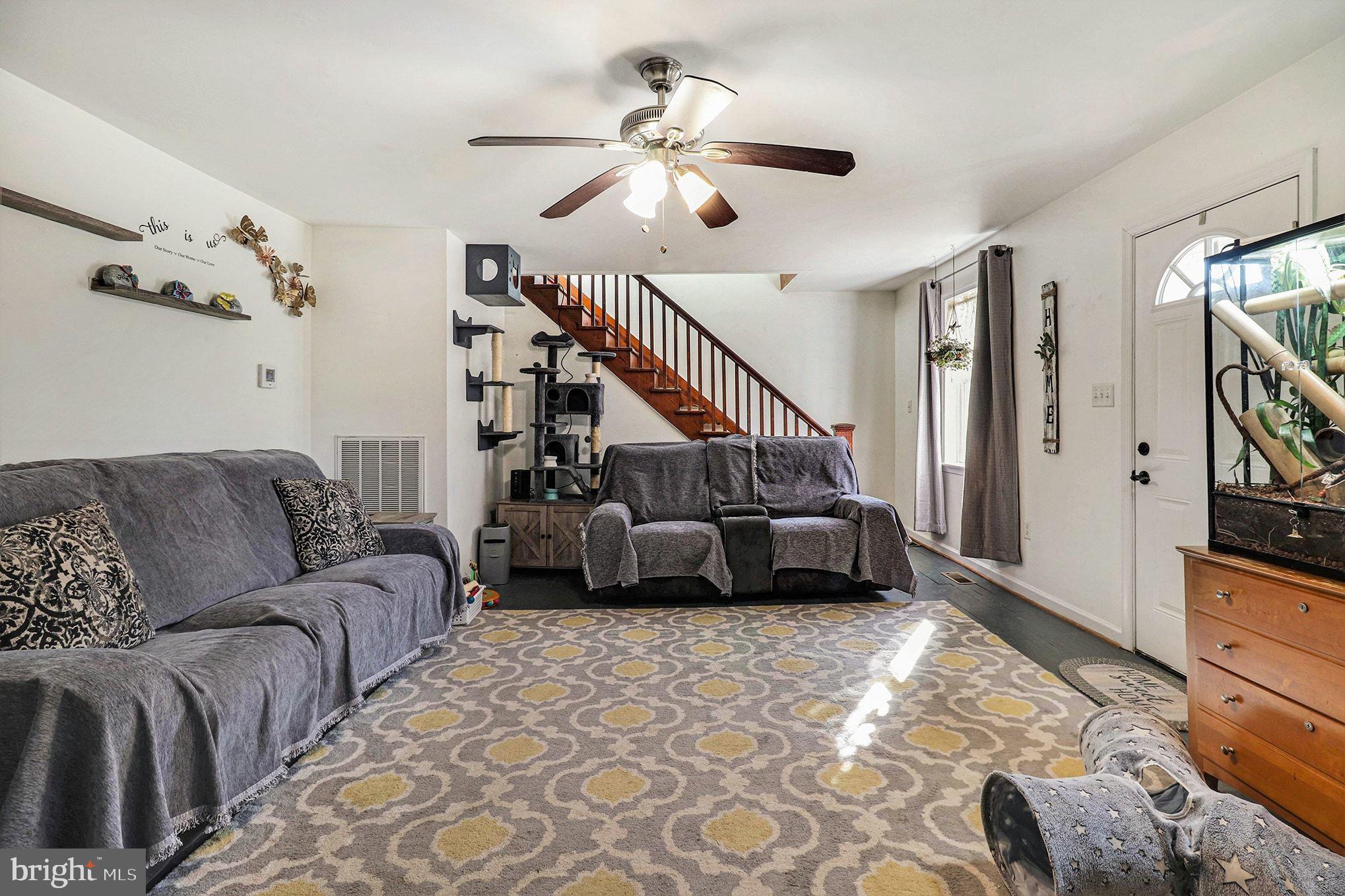 2033 Courthouse Road Heathsville, VA 22473 - Photo 14 of 50 a living room with furniture and a rug