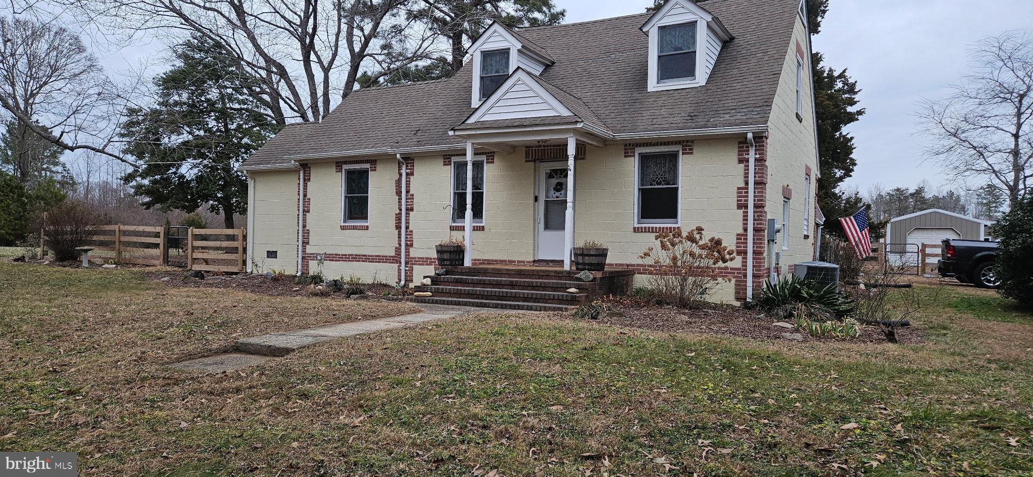 2033 Courthouse Road Heathsville, VA 22473 - Photo 3 of 50 a front view of a house with garden