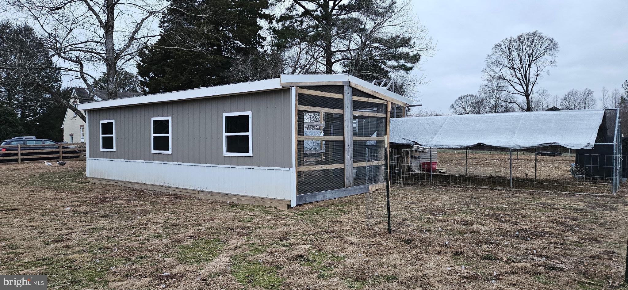 2033 Courthouse Road Heathsville, VA 22473 - Photo 35 of 50 a view of a house with a yard and garage