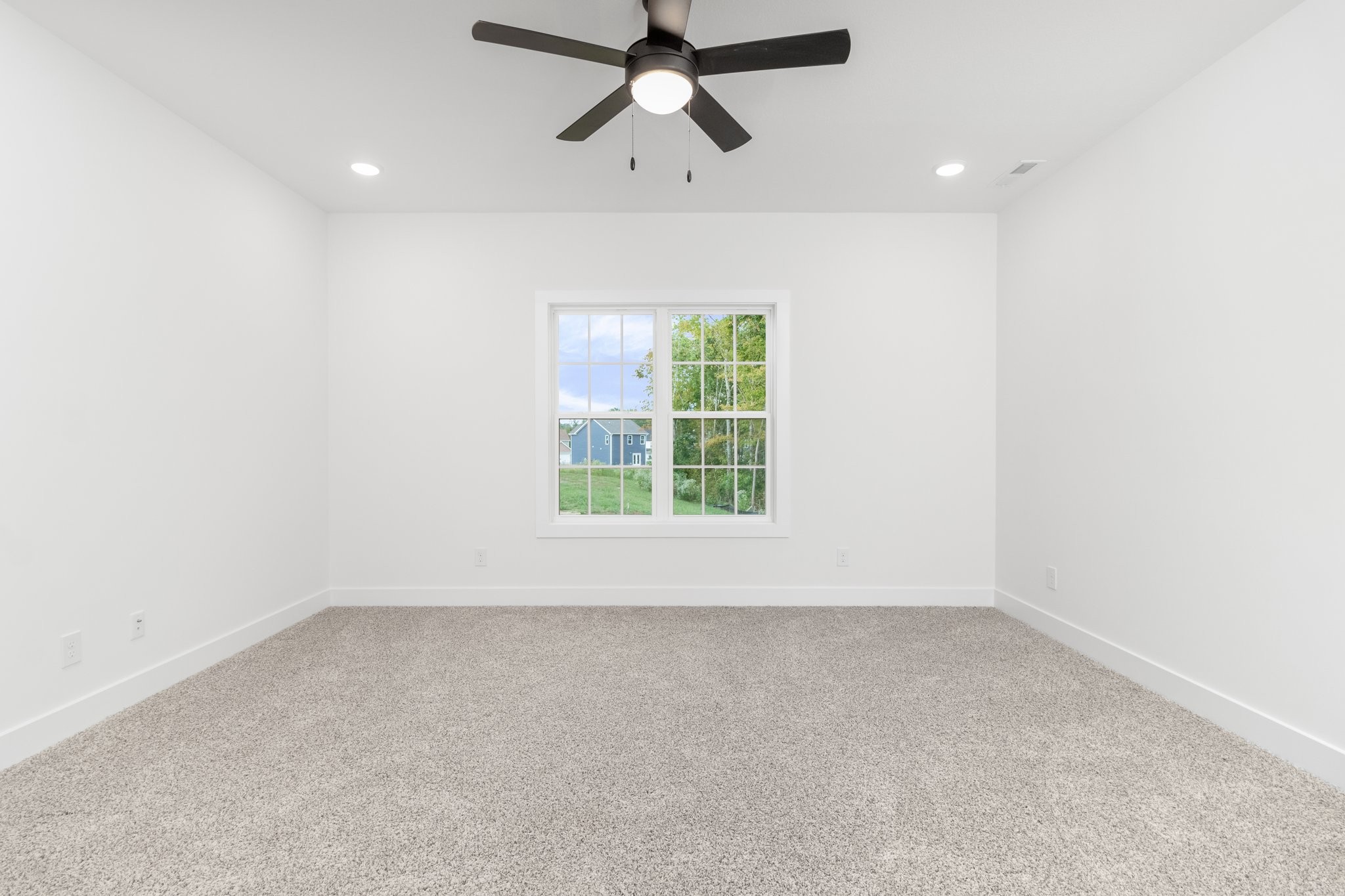 297 Wayne Hall Road Clarksville, TN 37040 - Photo 20 of 35 an empty room with a window and a fan