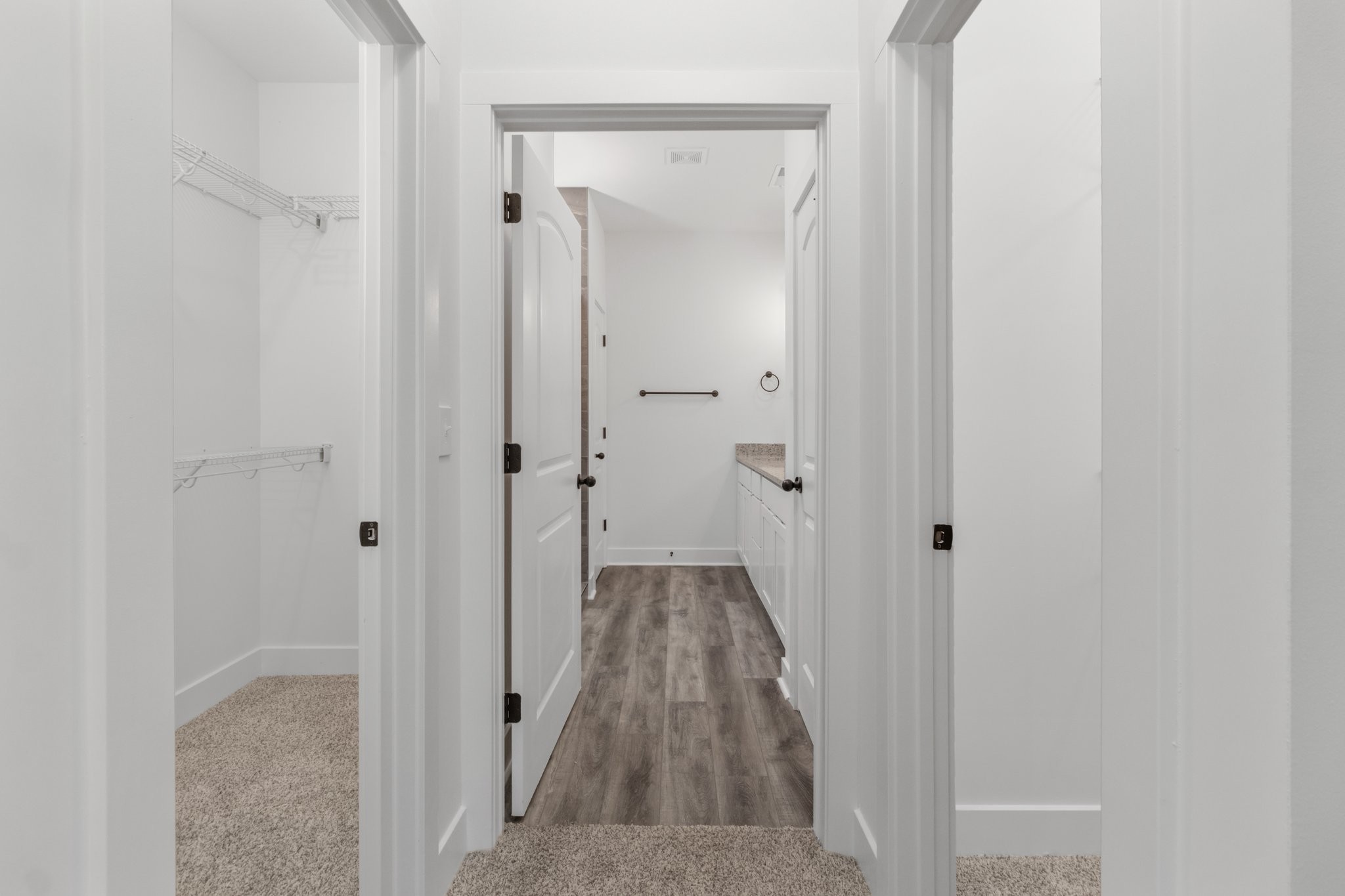 297 Wayne Hall Road Clarksville, TN 37040 - Photo 25 of 35 a view of a hallway with a wooden floor