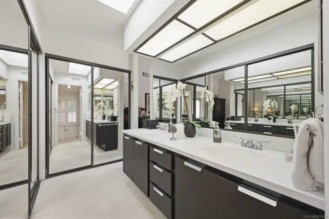 a kitchen with counter top space and sink