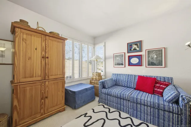 a living room with furniture or couch and a window