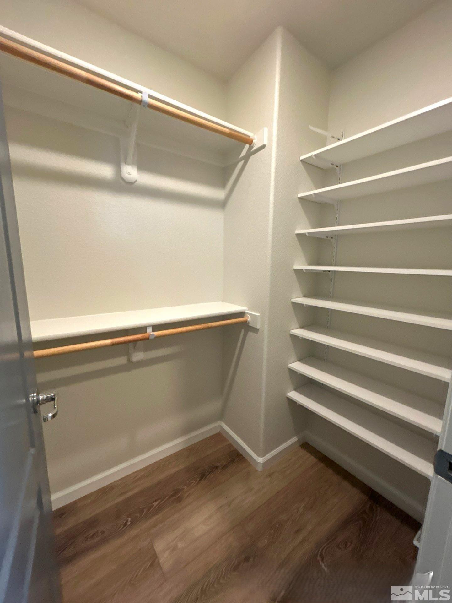 8908 Quail Falls Drive Reno, NV 89506 - Photo 11 of 20 a view of walk in closet with empty racks