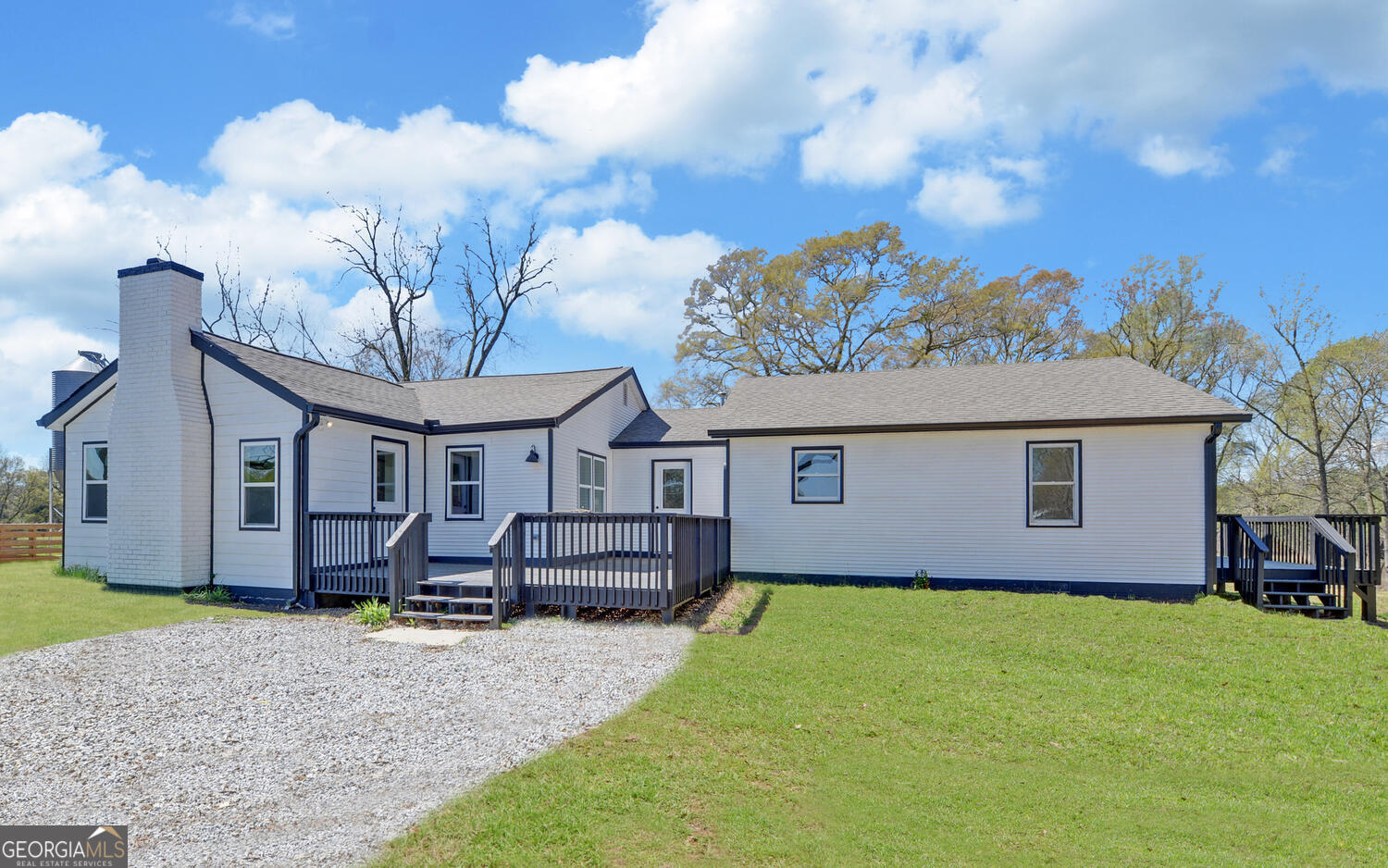 a house view with a garden space