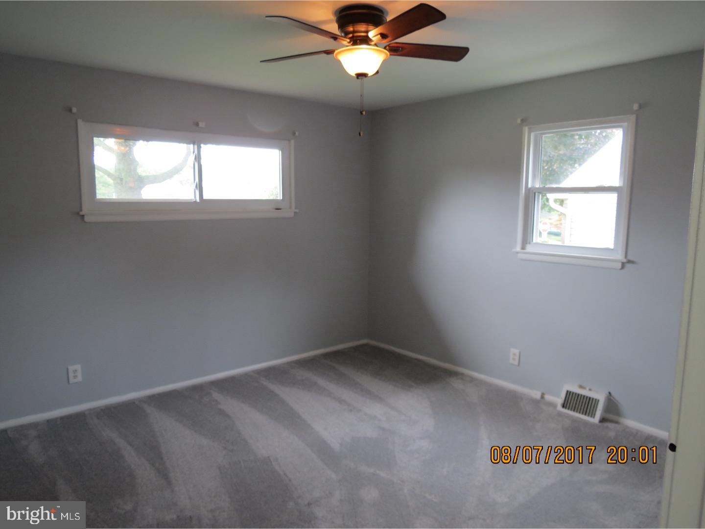 2505 Secane Road Secane, PA 19018 - Photo 16 of 21 an empty room with windows and fan