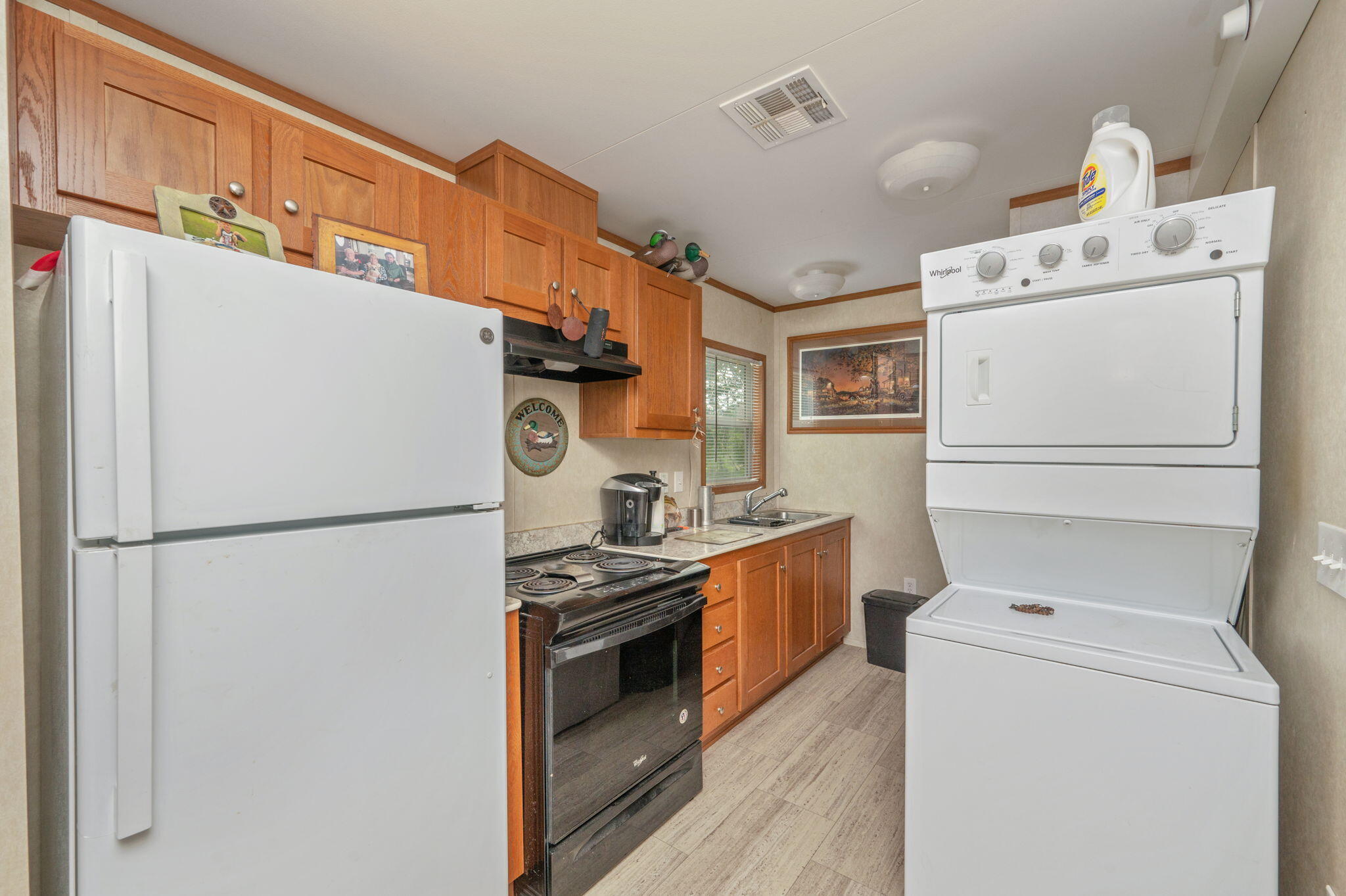 330 Dove Run Road Holt, FL 32564 - Photo 11 of 25 a utility room with dryer and washer