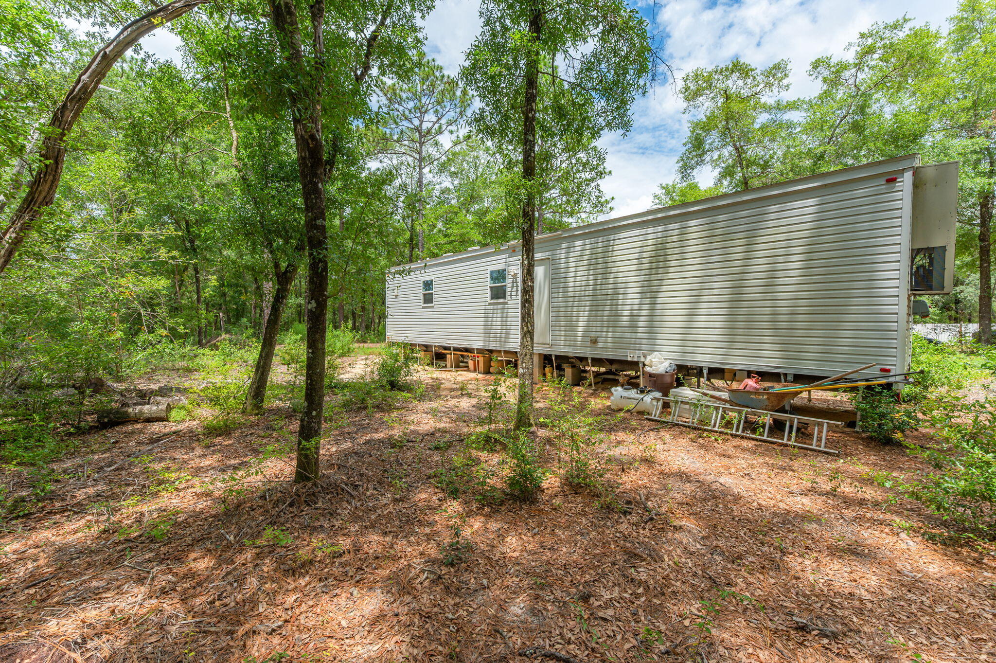 330 Dove Run Road Holt, FL 32564 - Photo 17 of 25 a view of a back yard of the house