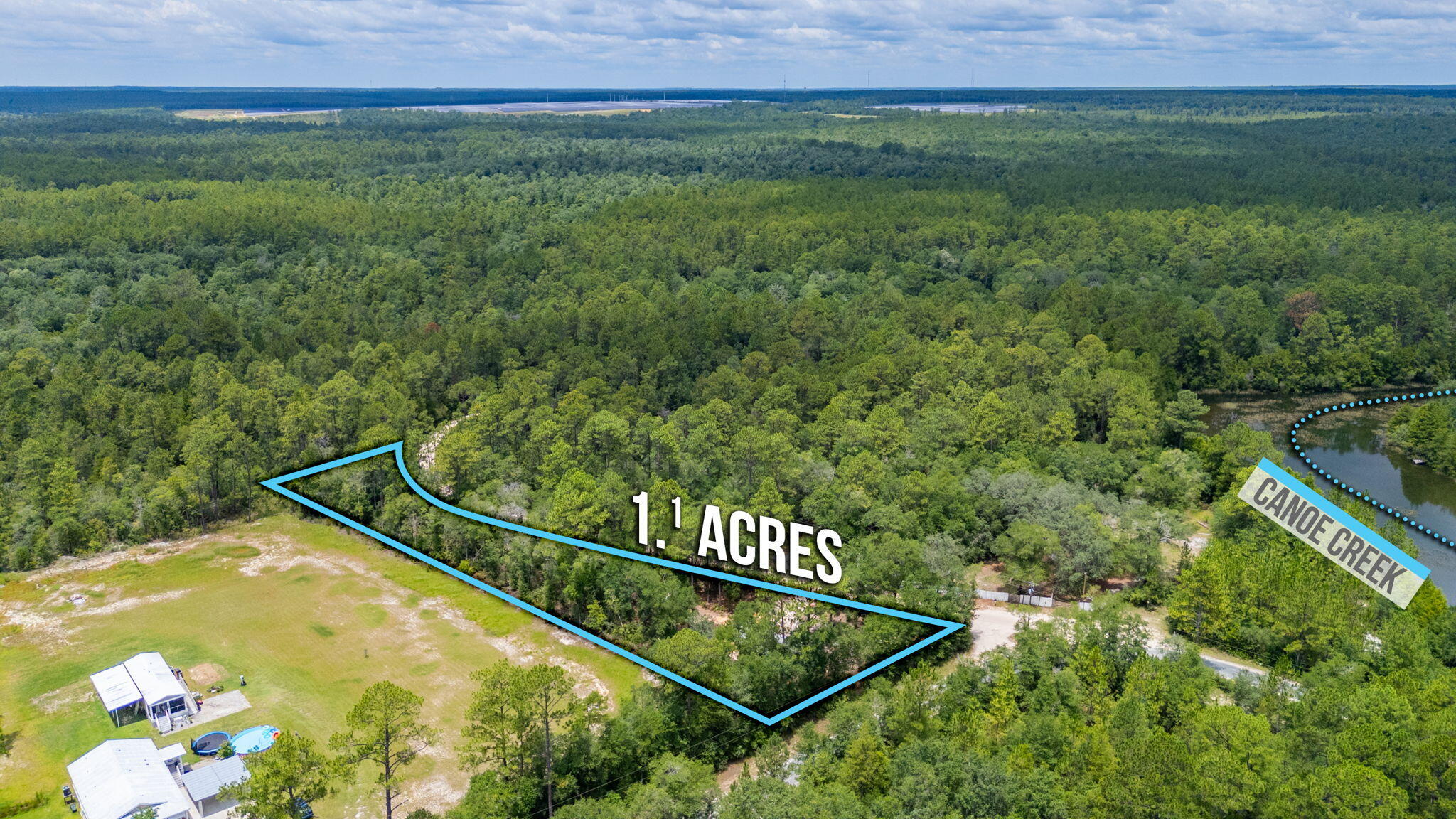 330 Dove Run Road Holt, FL 32564 - Photo 23 of 25 a view of a tennis court