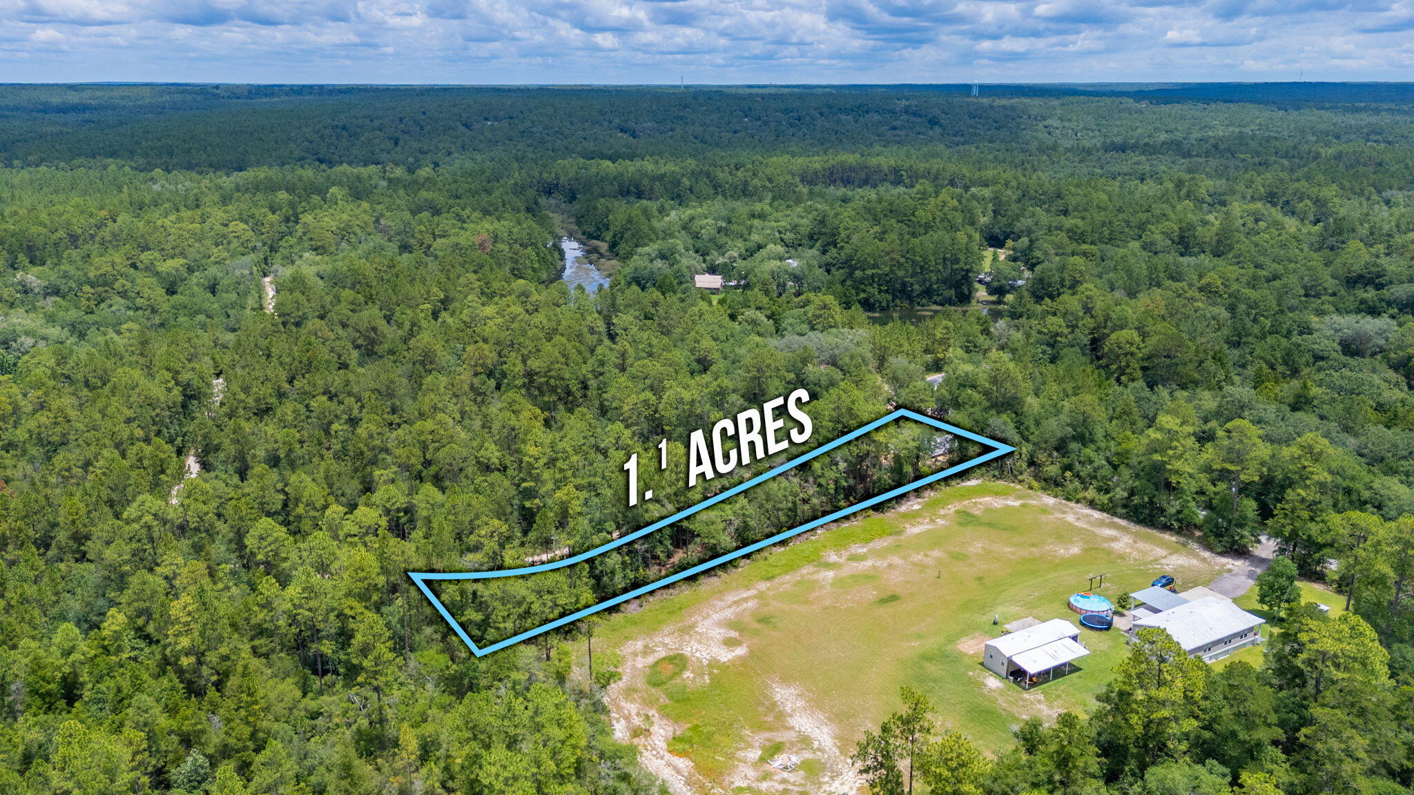 330 Dove Run Road Holt, FL 32564 - Photo 25 of 25 a view of a tennis court