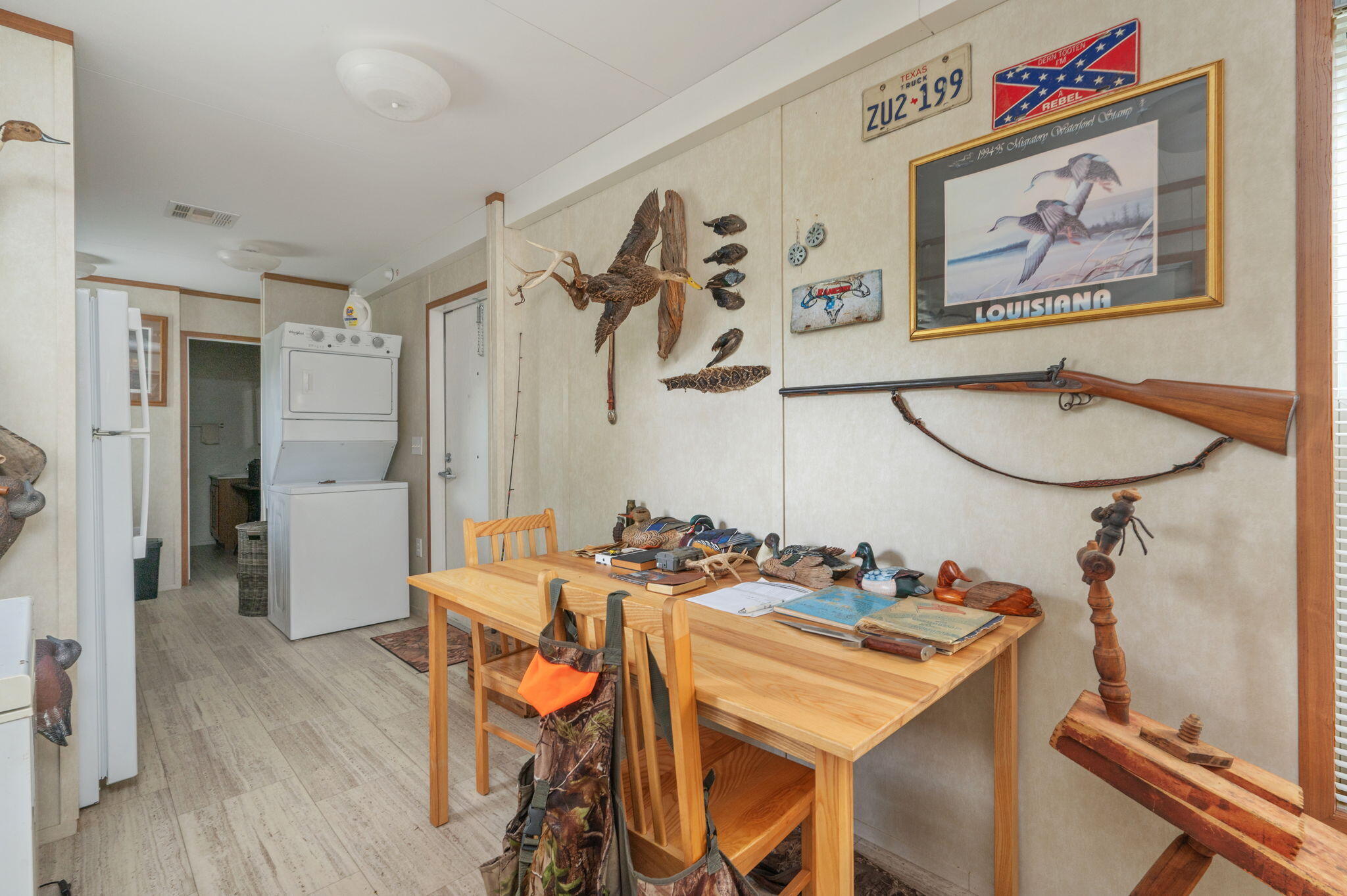 330 Dove Run Road Holt, FL 32564 - Photo 9 of 25 a view of a dining room with furniture and wooden floor