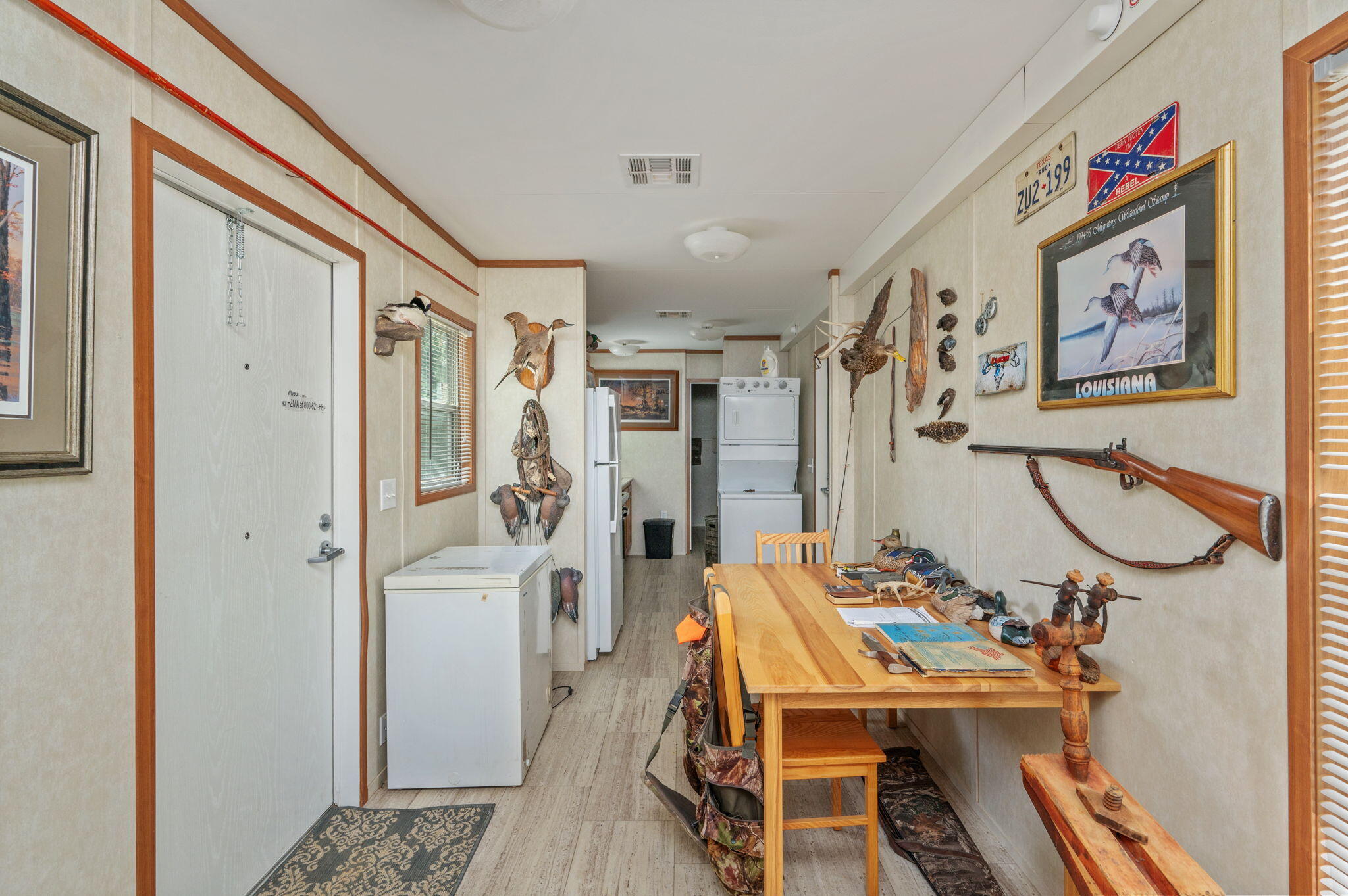 330 Dove Run Road Holt, FL 32564 - Photo 10 of 25 a view of a hallway with seating area