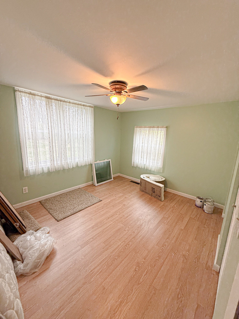 1599 East 2700 North Road Clifton, IL 60927 - Photo 23 of 26 a view of an empty room with a window