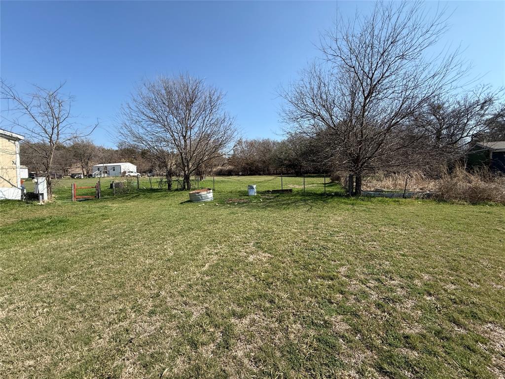 167 Blue Sky Lane Springtown, TX 76082 - Photo 24 of 34 a view of a field with large trees