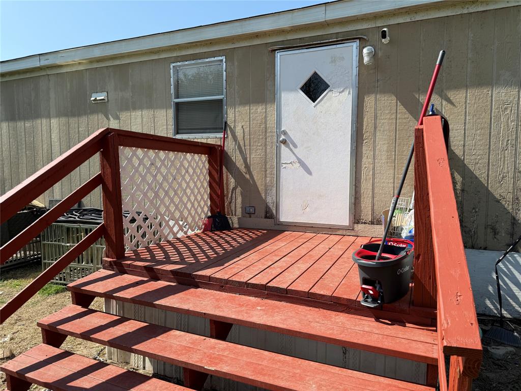 167 Blue Sky Lane Springtown, TX 76082 - Photo 34 of 34 a bedroom with a bed and a window