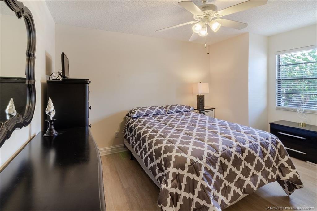 1811 Southwest Palm City Road, Unit A201 Stuart, FL 34994 - Photo 12 of 20 Guest Bedroom