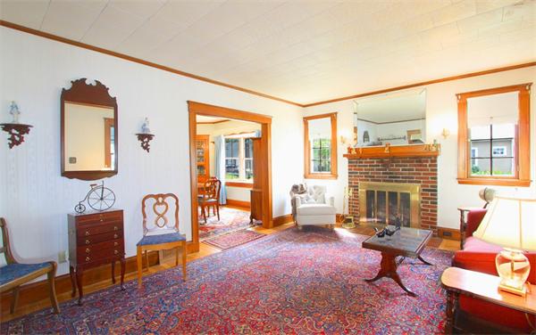 158 Parmenter Road Newton, MA 02465 - Photo 3 of 19 a living room with furniture a rug and a window