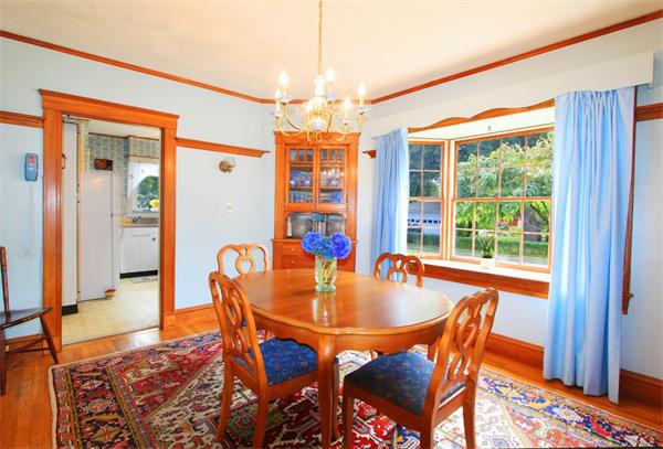 158 Parmenter Road Newton, MA 02465 - Photo 7 of 19 a dining room with furniture a chandelier and wooden floor