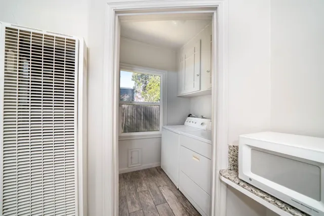 a bathroom with a toilet sink and tub