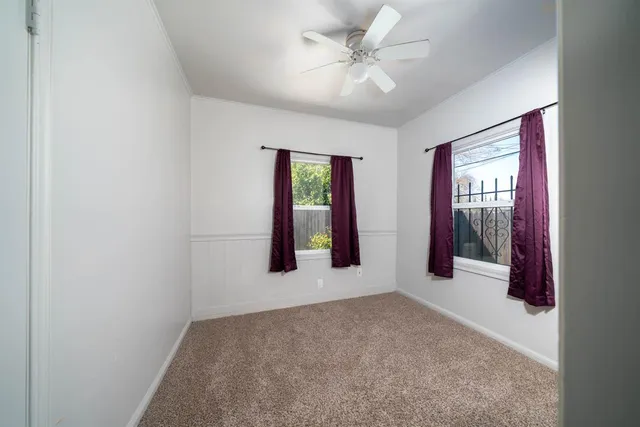 a view of an empty room with window