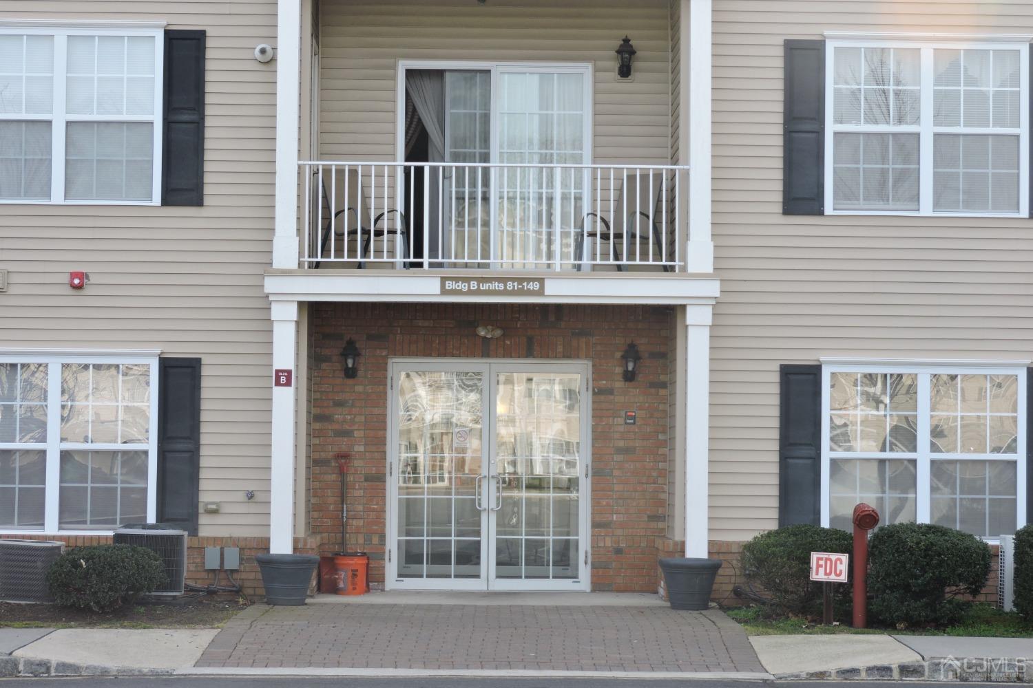 81 Liddle Avenue Edison, NJ 08837 - Photo 2 of 20 a front view of a house with a parking space