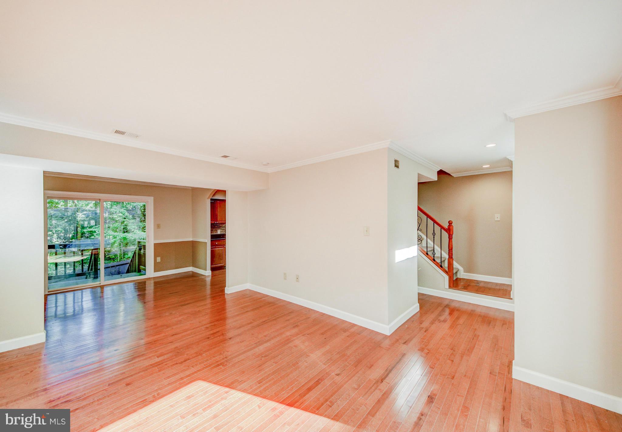 2459 Pyrenees Court Reston, VA 20191 - Photo 11 of 28 wooden floor in an empty room with a window