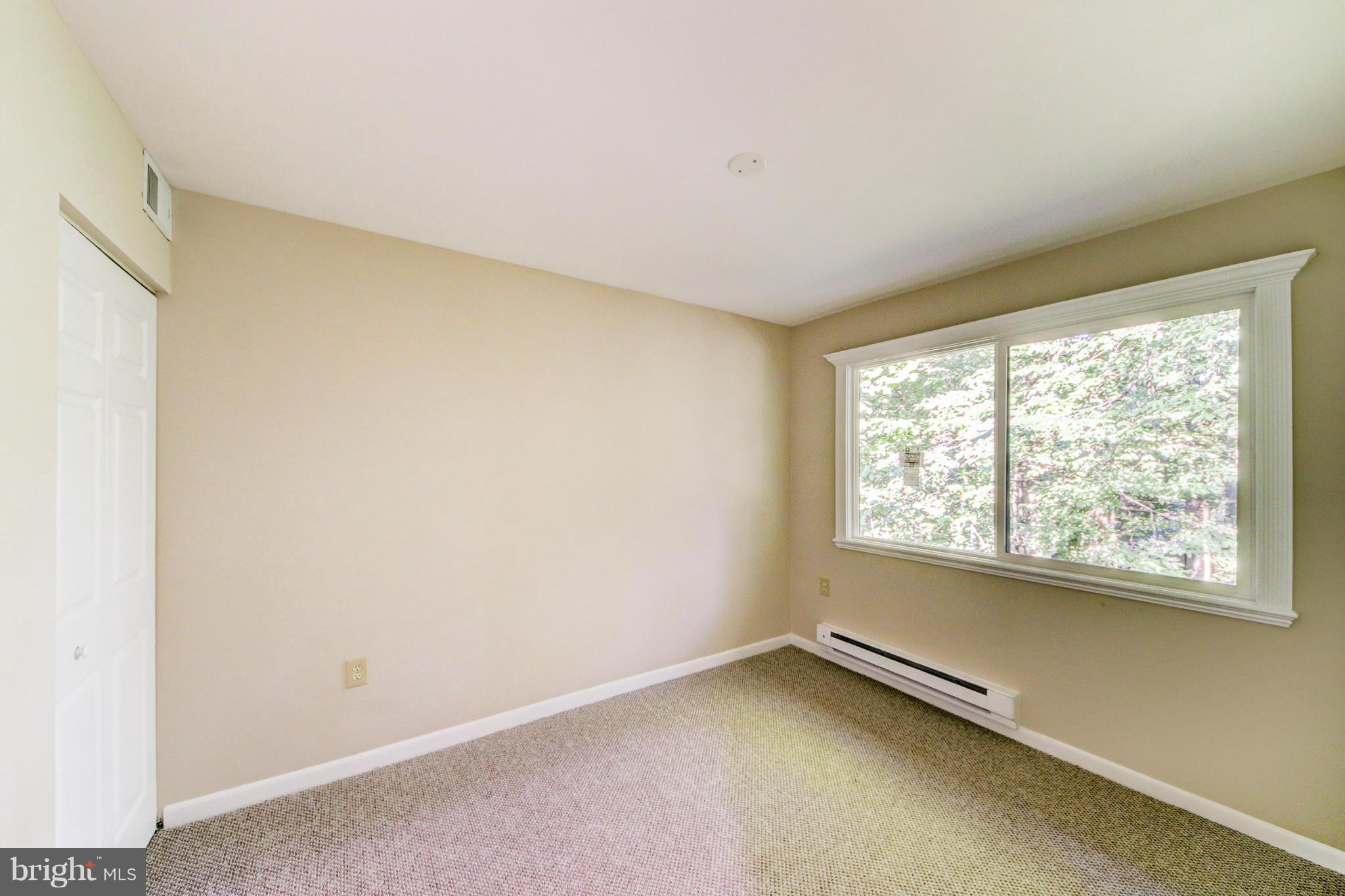 2459 Pyrenees Court Reston, VA 20191 - Photo 18 of 28 an empty room with a window