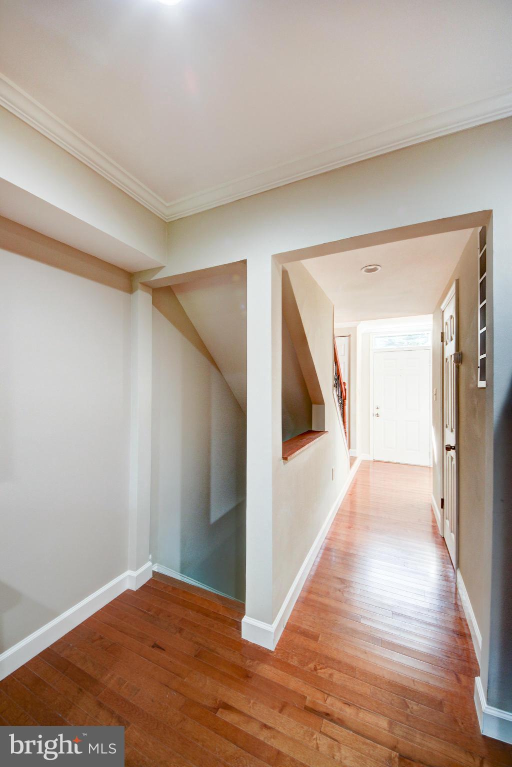2459 Pyrenees Court Reston, VA 20191 - Photo 26 of 28 a view of hallway with wooden floor