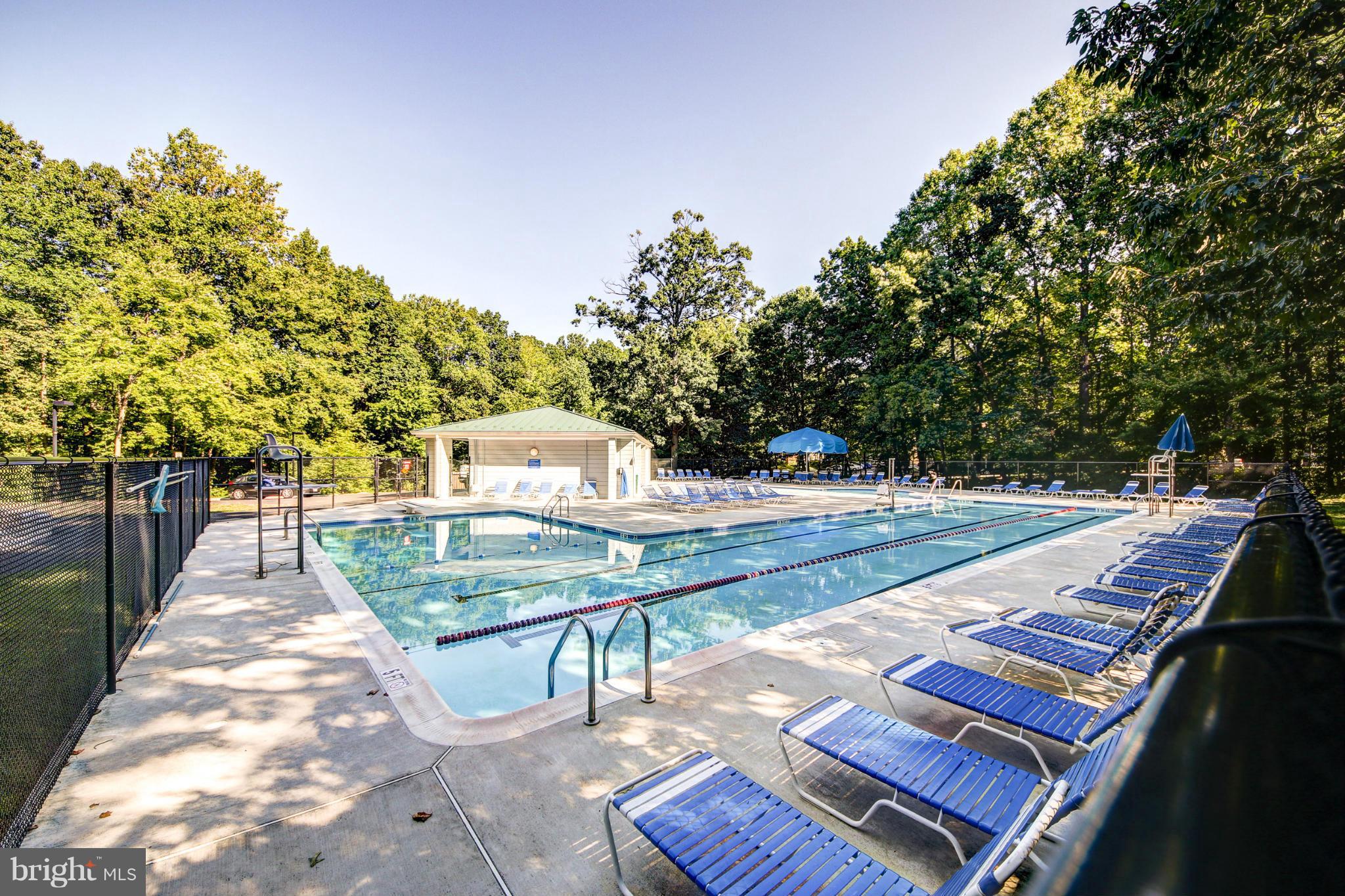 2459 Pyrenees Court Reston, VA 20191 - Photo 28 of 28 a view of a patio with chairs next to a yard