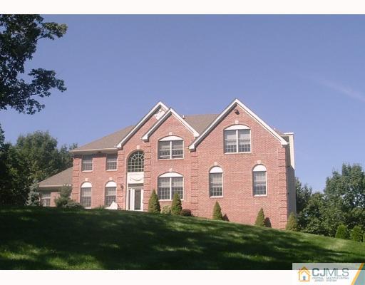 98 Bennett Road Old Bridge, NJ 07747 - Photo 1 of 10 a front view of a house with a yard