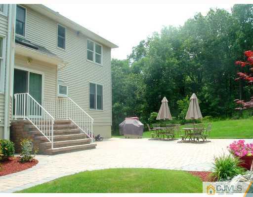 98 Bennett Road Old Bridge, NJ 07747 - Photo 9 of 10 a front view of a house with garden