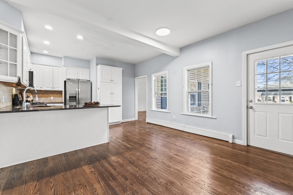 1142 Washington Street Whitman, MA 02382 - Photo 14 of 32 a view of kitchen and wooden floor